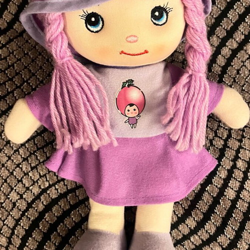 Cloth doll like new, soft purple