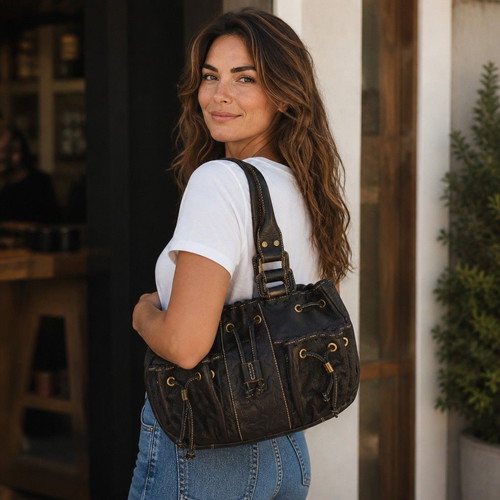 Tous black leather shoulder bag with embossed bears and pockets