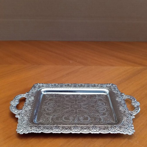 Vintage decorative tray with embossed designs, silver color
