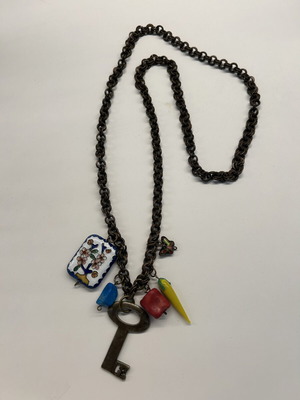 Long necklace with chain and metal charms like new, brown