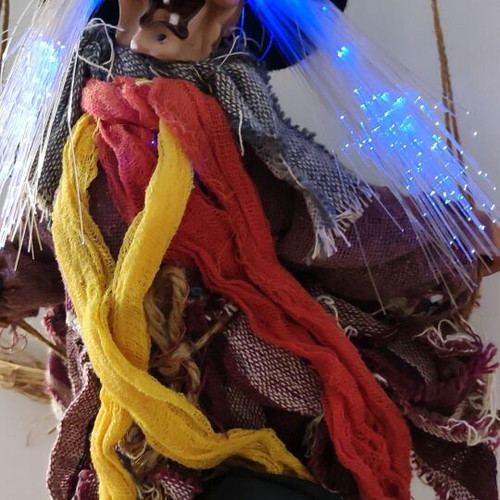 Witch figure used with sound and light-up hair