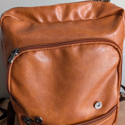 Vintage unisex backpack in brown faux leather with laptop compartment