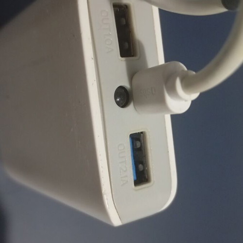 USB charger with flashlight, used, two charging ports