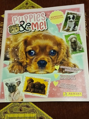 Puppies & Me-Panini sticker album like new with 37 of 184 stickers