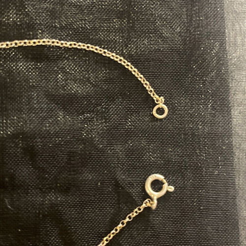 Silver delicate bracelet with cross and eye like new