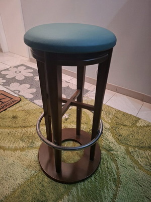 Wooden stool with green leather seat like new