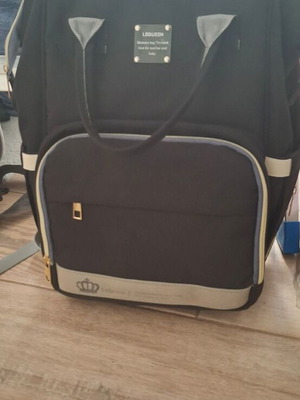 Lequeen Backpack Diaper Bag Black like new with changing mat and bottle warmer