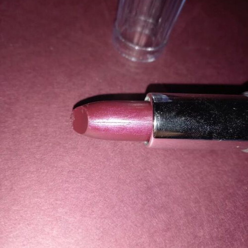 Purple lipstick shiny new with subtle glitter