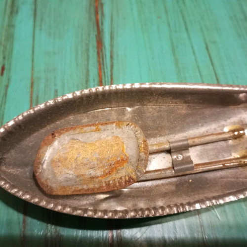 Tin pat pat boat collectible from the 60s