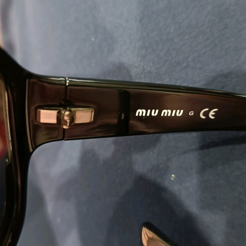 Miu Miu sunglasses used, large black
