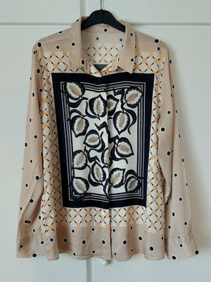Silk women's shirt like new with geometric and leaf pattern