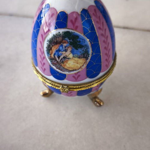 Limoges decorative porcelain egg-shaped box with gold details like new