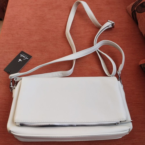 Women's bag new, adjustable strap, white-cream color, zip pockets