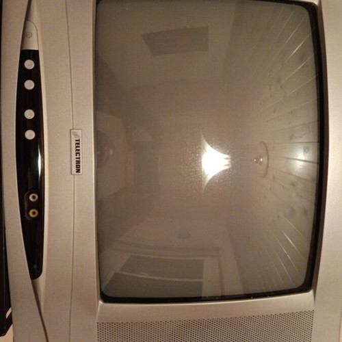 Television 14" with decoder, 2 remote controls used, wall mount included