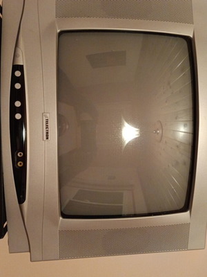 Television 14" with decoder, 2 remote controls used, wall mount included