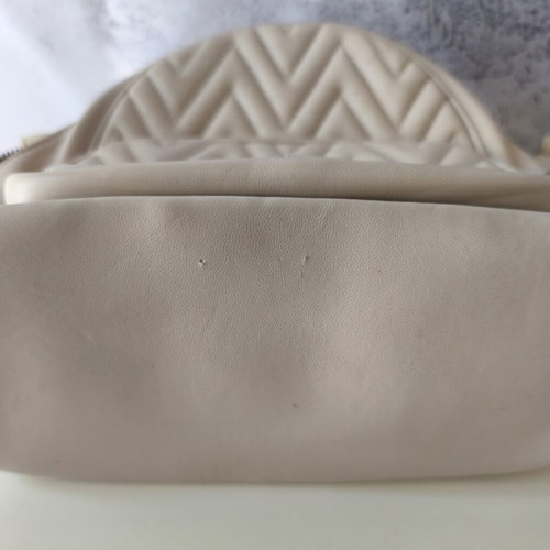 David Jones backpack used, beige with embossed design
