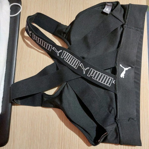Puma sports bra new, black with crisscross back
