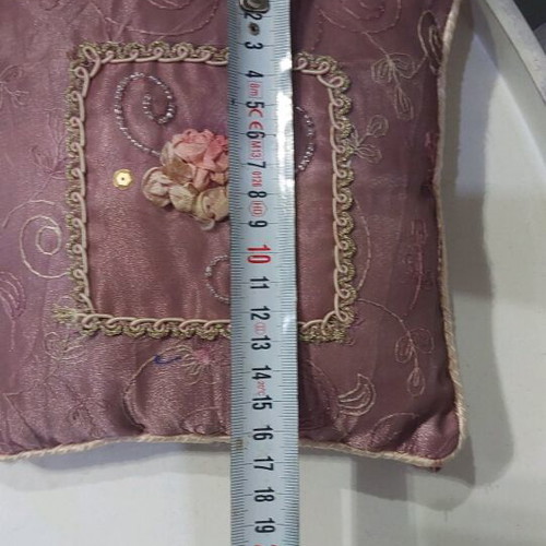 Vintage decorative pillow used with embroidery and embossed flowers