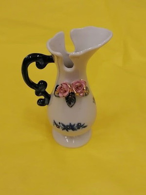 Vintage porcelain decorative mini jug with embossed roses like new