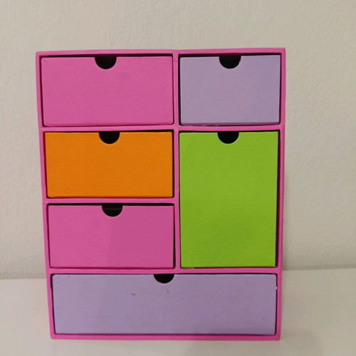 Colorful desktop organiser with drawers used