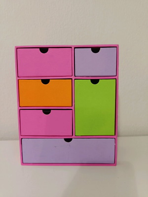 Colorful desktop organiser with drawers used