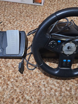 Logitech PS2 steering wheel used for PlayStation 2