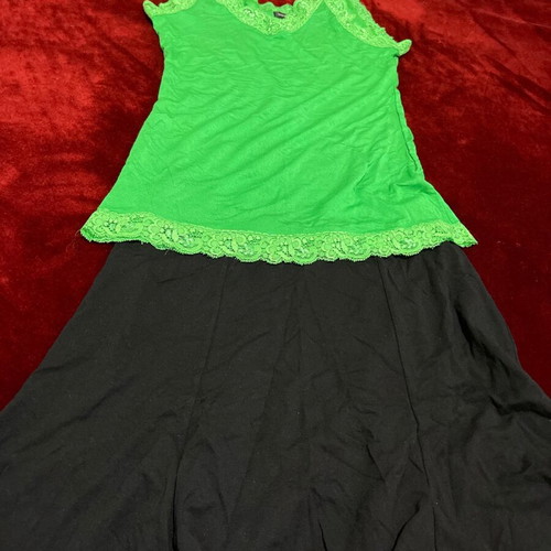 Women's set of 2 pieces used, black BSB skirt and green Voyelles lace top