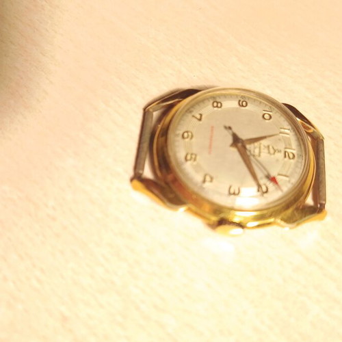 Venus vintage wristwatch used, gold color, mechanical 17 rubis