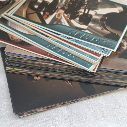 Large collection of cards, movies, sports used