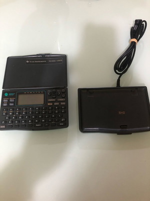 Texas Instruments PS-6560i vintage pocket computer like new