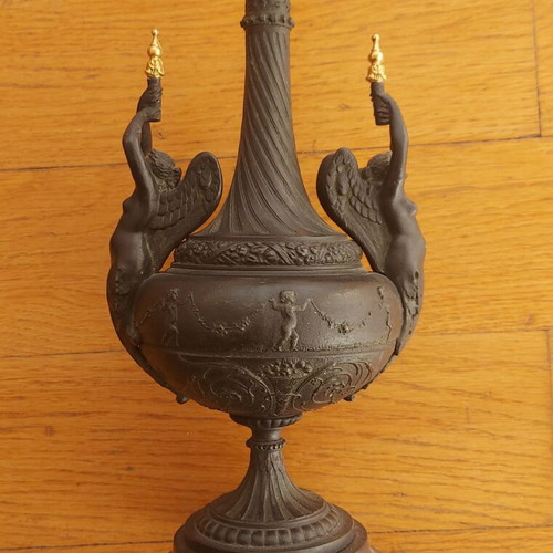 Ancient Greek hydria Empire style used with granite base and winged torchbearers