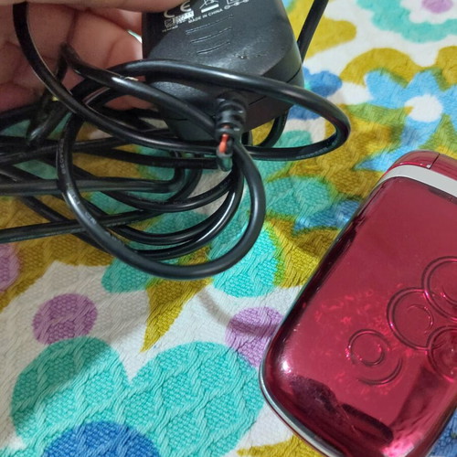 Alcatel vintage flip phone used, red, charger included