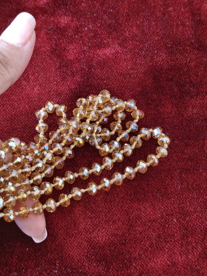 Honey Amber crystal necklace like new, long knotted style