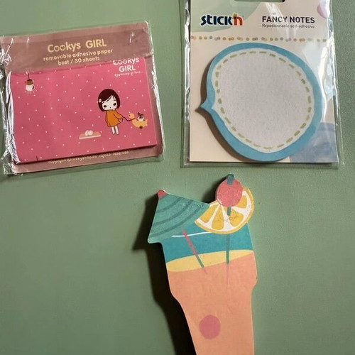 School supplies set with notebooks, pens, pencils, stickers, and case