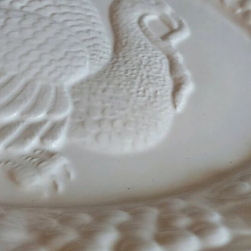 Large ceramic oval platter with embossed design like new