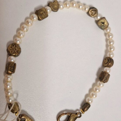 Bracelet old and unused with metal elements