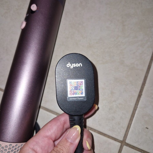 Dyson hair styler with attachments