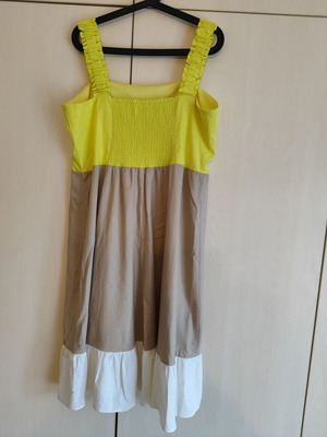 Dress new with beige and yellow color, size XL