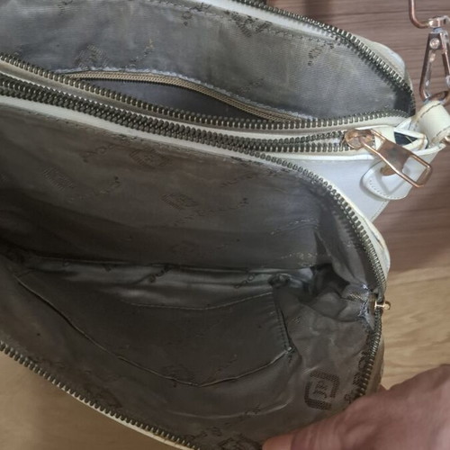 Crossbody bag used with compartments