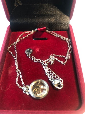 Necklace with gold plated tree of life and floating zircons like new
