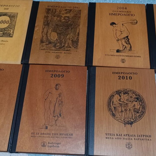 Collectible calendars like new with wooden cover
