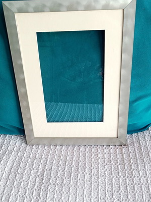 Metal photo frame like new with light-colored mat