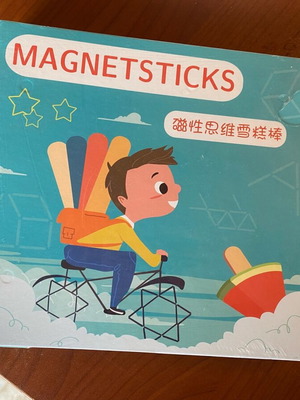 Puzzle game with magnetic sticks new