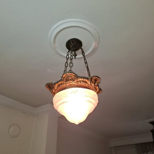 Antique brass ceiling light used with carved glass cover