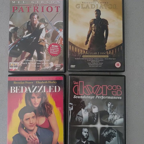 DVD movies like new with subtitles, Gladiator, The Patriot, The Doors, Bedazzled