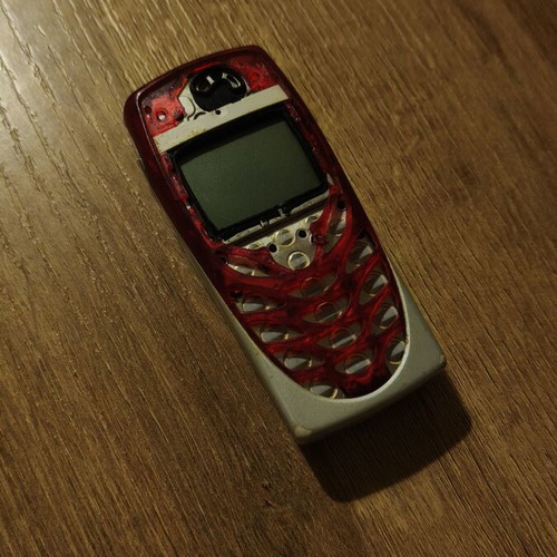 Nokia 8310 phone, red, for repair or parts