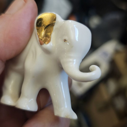 Sitzendorf porcelain elephant used, with leg flaw