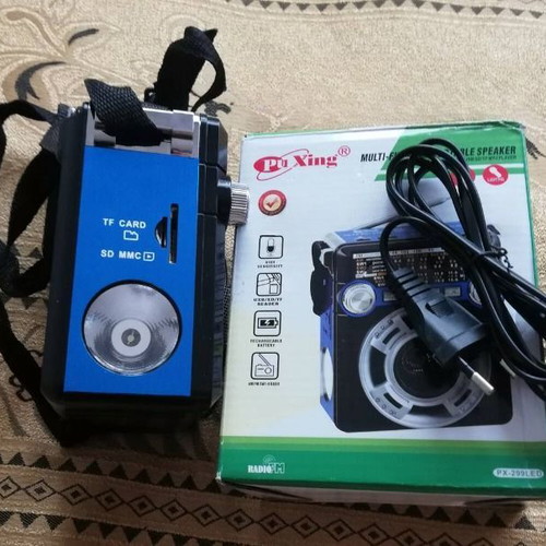 Radio receiver with powerful flashlight new, blue