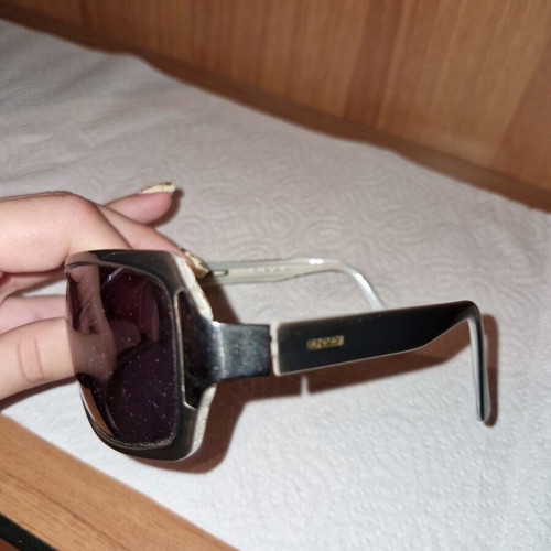 Sunglasses used, black and purple