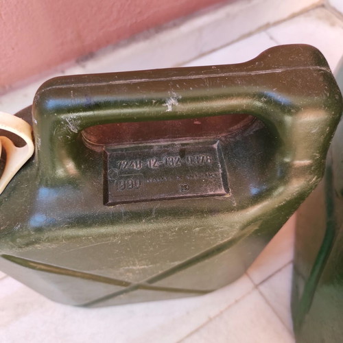 Two military canisters, metal and plastic, functional
